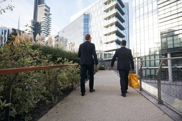 istock business people working outside office building 1207959706