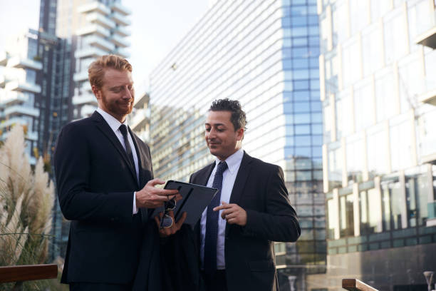 istock business people working outside office building 1207959855