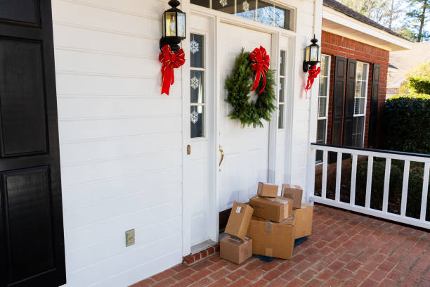 istock Mail Order packages on front porch during the holiday season 1207968309