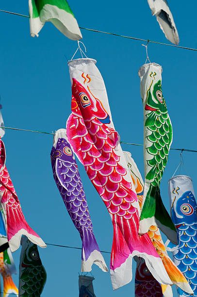 istock Koinobori - carp-shaped streamers against blue sky 120797004