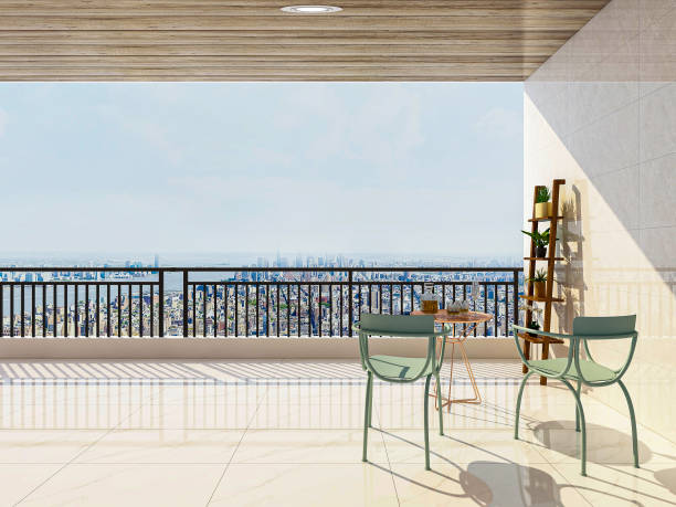 istock Open balcony designed with chairs, table and area for children to play 1207970614