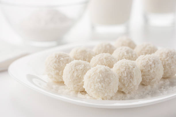 istock Small round cakes sprinkled with coconut shavings. 1207970670