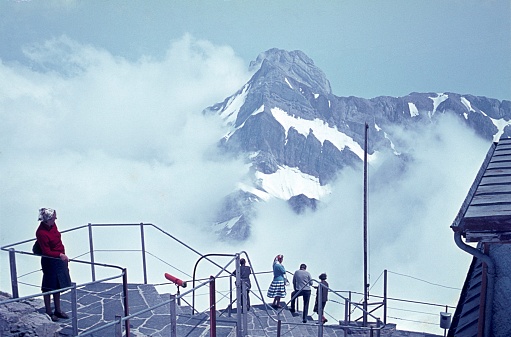 Alpine region (unfortunately the exact location is not known), Germany, 1970. Viewing platform with view of the Alps. Also: tourists.