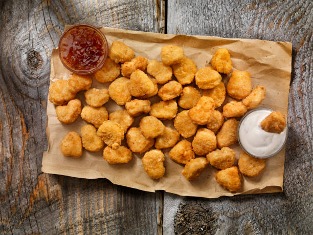 Pub Style, Popcorn Chicken With Dipping Sauce Pub Style, Popcorn Chicken With Dipping Sauce nugget photos stock pictures, royalty-free photos & images