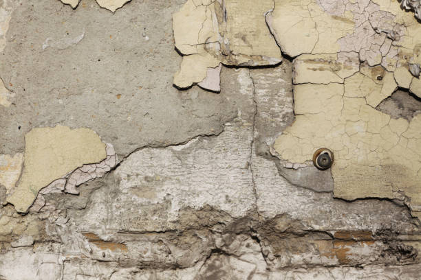 istock Texture old stucco, wall dirty and cracked 1207976843