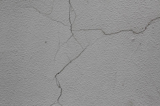 istock Texture old stucco, wall dirty and cracked 1207979142
