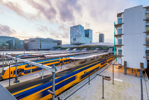 Utrecht, Netherlands - February 19, 2020: Departing Train at Central Station of Utrecht, Netherlands. Being located in the center of the country Utrecht Central Station is a major transit hub.