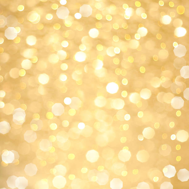 istock Abstract golden bokeh background 1207982845
