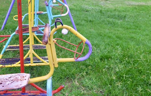 istock Metal Swing with Horse Shape in Kid Playground 1207986042