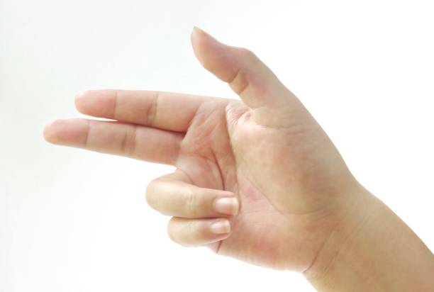 istock Hand Making Pistol Sign and Shooting Gun 1207986074