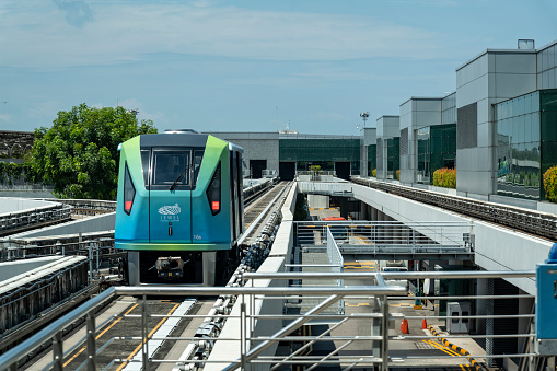 The Changi Airport Skytrain is an automated people mover (APM) that connects Terminals 1, 2 and 3 at Singapore Changi Airport. Opened in 1990, it was the first driverless and automated system of its kind in South East Asia.