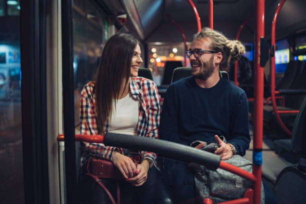 istock Friends traveling by bus 1207996669