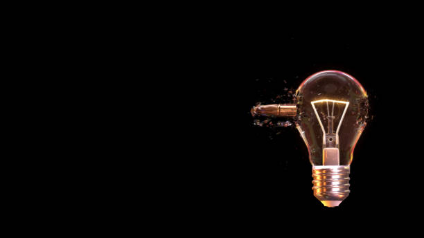 istock The glass bulb light explosion by bullet through with 3d rendering. 1207997743