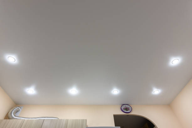 istock Location around the perimeter of point lights on a white matte tension ceiling 1208000921