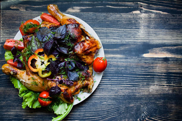 istock Tobacco Chicken and Fresh Vegetables 1208005425