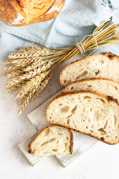 istock Freshly baked homemade artisan sourdough bread. Sliced. Top view. Copy space. 1208007671