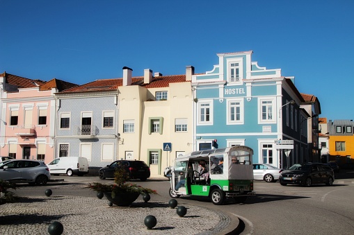 Aveiro,Porto, Portugal- January 5, 2020: Beautiful and old colorful typical facades next to the water canal in Aveiro village in January