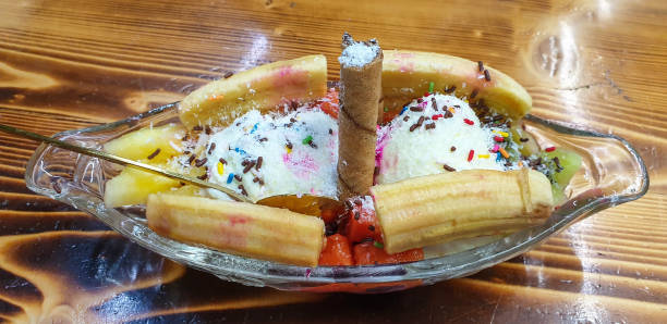 Banana split with tropical fruit