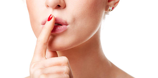 istock Beautiful young woman shows be quit sign. 120801326