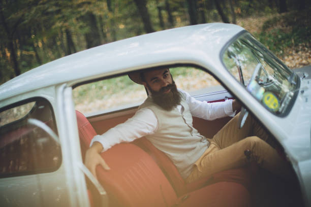 istock Hipster men traveling in his old timer 1208013831