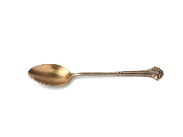 istock silver vintage small coffee spoon for pouring sugar isolated on a white background 1208021268