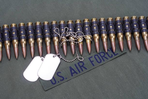 istock ammunition belt and dog tags on US AIR FORCE uniform background 1208022077