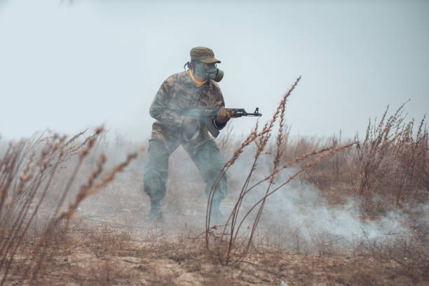 istock soldier in combat searching for enemy 1208022146