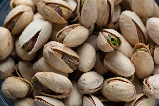 istock Pile Of Roasted And Salted Pistachios 1208022247
