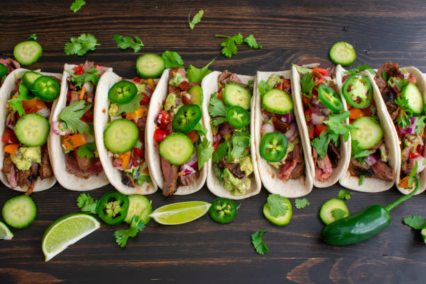 istock Grilled Flank Steak Tacos with Guacamole and Pico de Gallo 1208024572