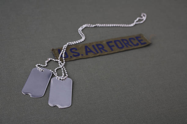 istock U.S. AIR FORCE Branch Tape with dog tags on olive green uniform 1208025615