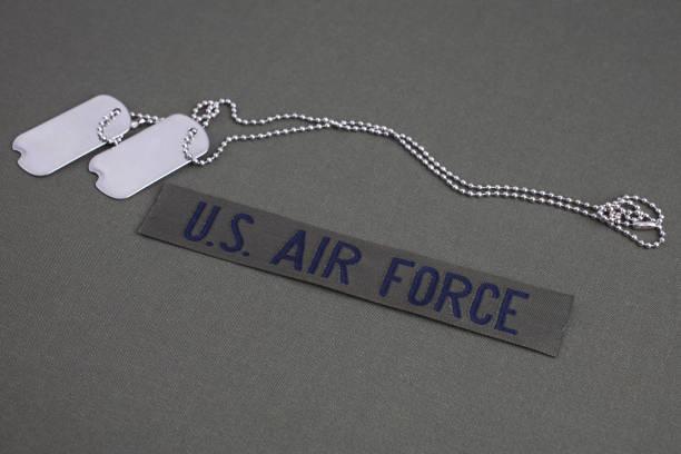 istock U.S. AIR FORCE Branch Tape with dog tags on olive green uniform 1208025706