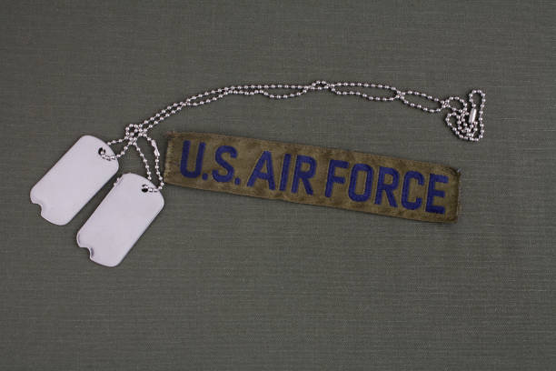 istock U.S. AIR FORCE Branch Tape with dog tags on olive green uniform 1208025725