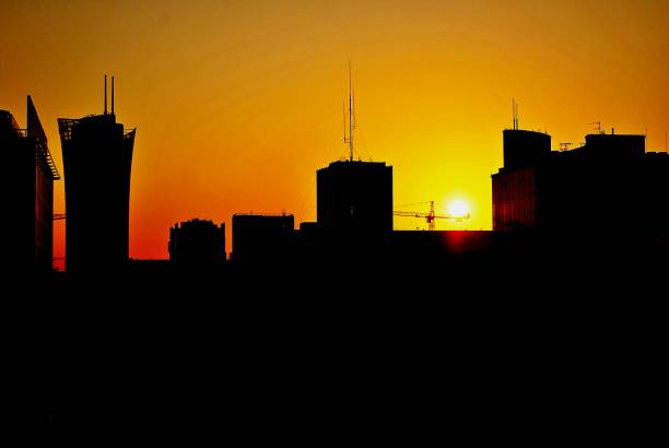 istock City in silhouette during sunset 1208043600