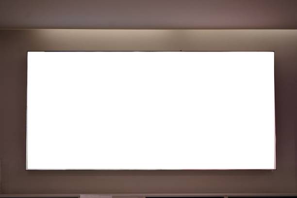 istock Blank showcase billboard for your text message or media content with blurred image popular fashion clothes shop. 1208044462