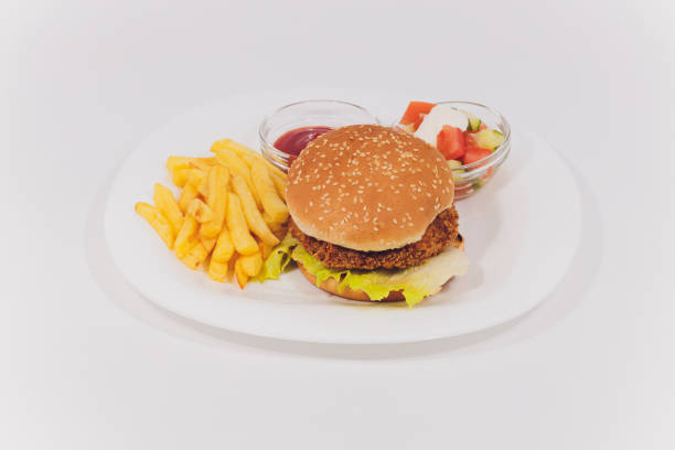 istock Mini Burger platter with fries Salad isolated on white background. 1208045863