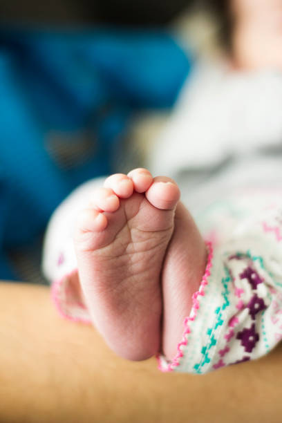 istock Closeup of a baby’s foot 1208059748