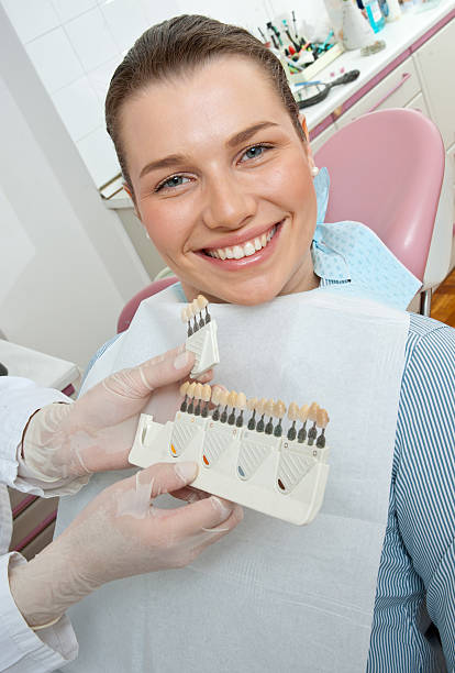 istock woman choosing dental cover 120806194