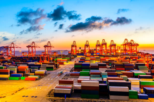 istock Industrial port container freight terminal at beautiful sunset in Shanghai. 1208062861
