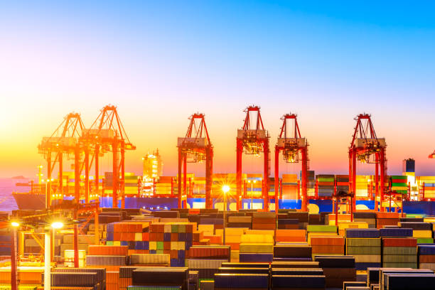 istock Industrial port container freight terminal at beautiful sunset in Shanghai. 1208063114