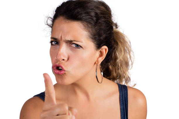 istock Woman looking at camera and angry with someone. 1208063697
