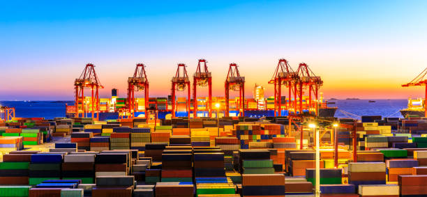 istock Industrial port container freight terminal at beautiful sunset in Shanghai. 1208063766