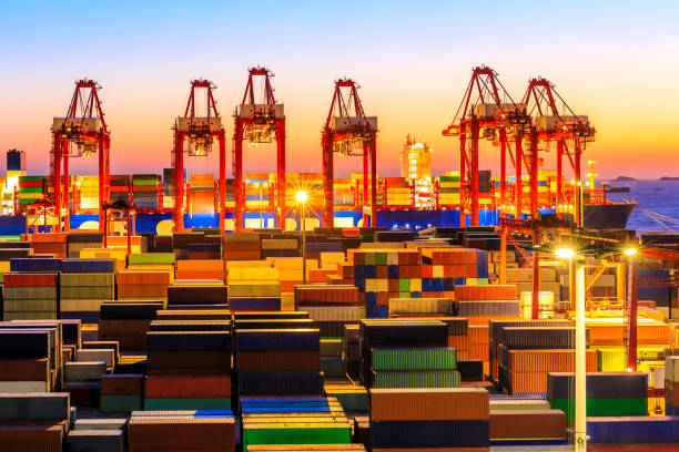 istock Industrial port container freight terminal at beautiful sunset in Shanghai. 1208063921