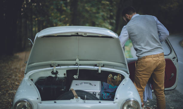 istock Hipster men traveling in his old timer 1208068519