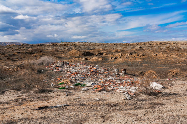 Pile of garbage in the field, environmental pollutio