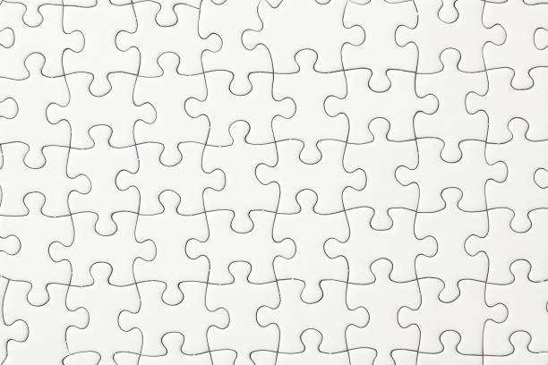 istock Close-up of blank white jigsaw puzzle texture background. 1208080046