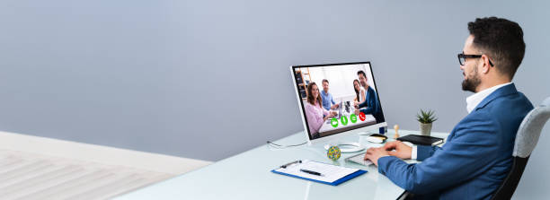 istock Businessman Video Conferencing With Coworkers 1208085203
