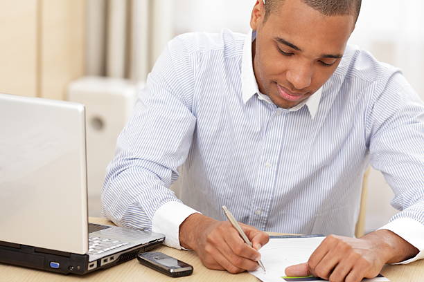 istock Young african-american businessman working 120808923
