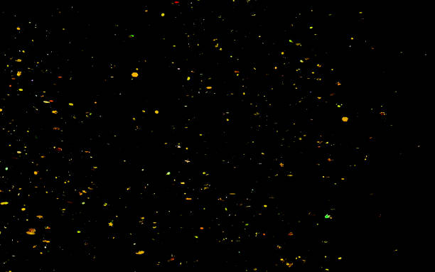 istock Golden confetti. Abstract background with golden shiny sparkling sparkles. 1208090442