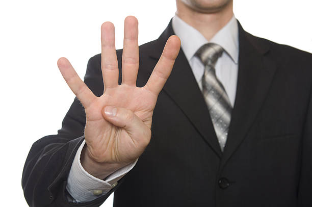 istock well shaped business man hand count. four 120809137