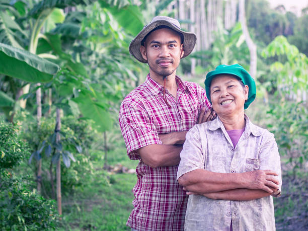 istock Asian agriculturist, mother and son 1208092905